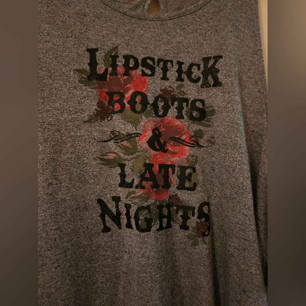 Ladies off shoulder shirt.